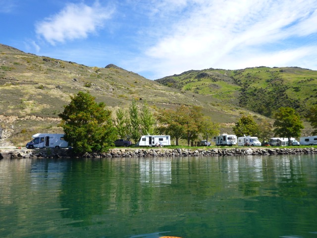 Motorhomes along the lake edge at Burtons Creek.